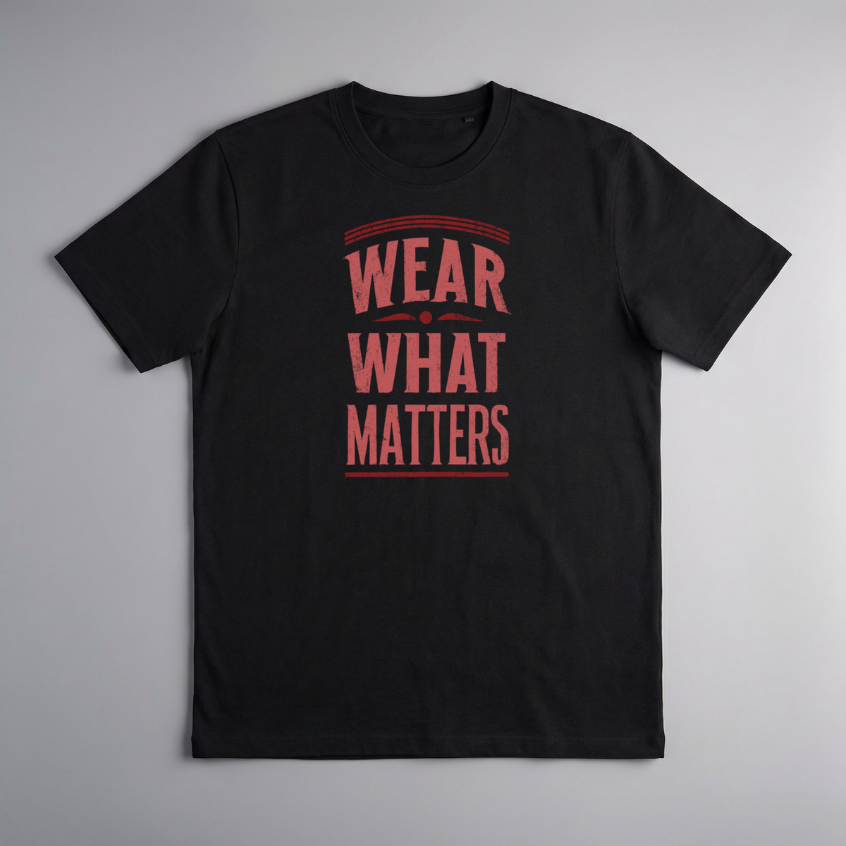 gravisk Wear What Matters organic graphic tee. WEAR WHAT MATTERS in worn red capitals between thin rules.