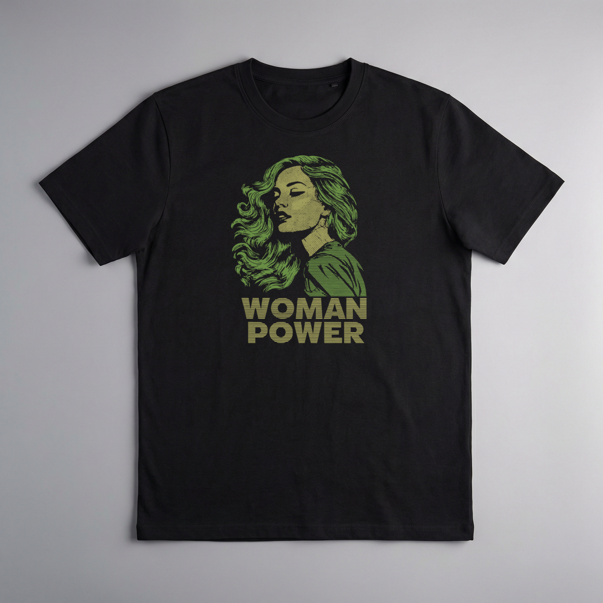 gravisk Woman Power organic graphic tee. Olive green portrait of a woman with flowing hair, WOMAN POWER below.