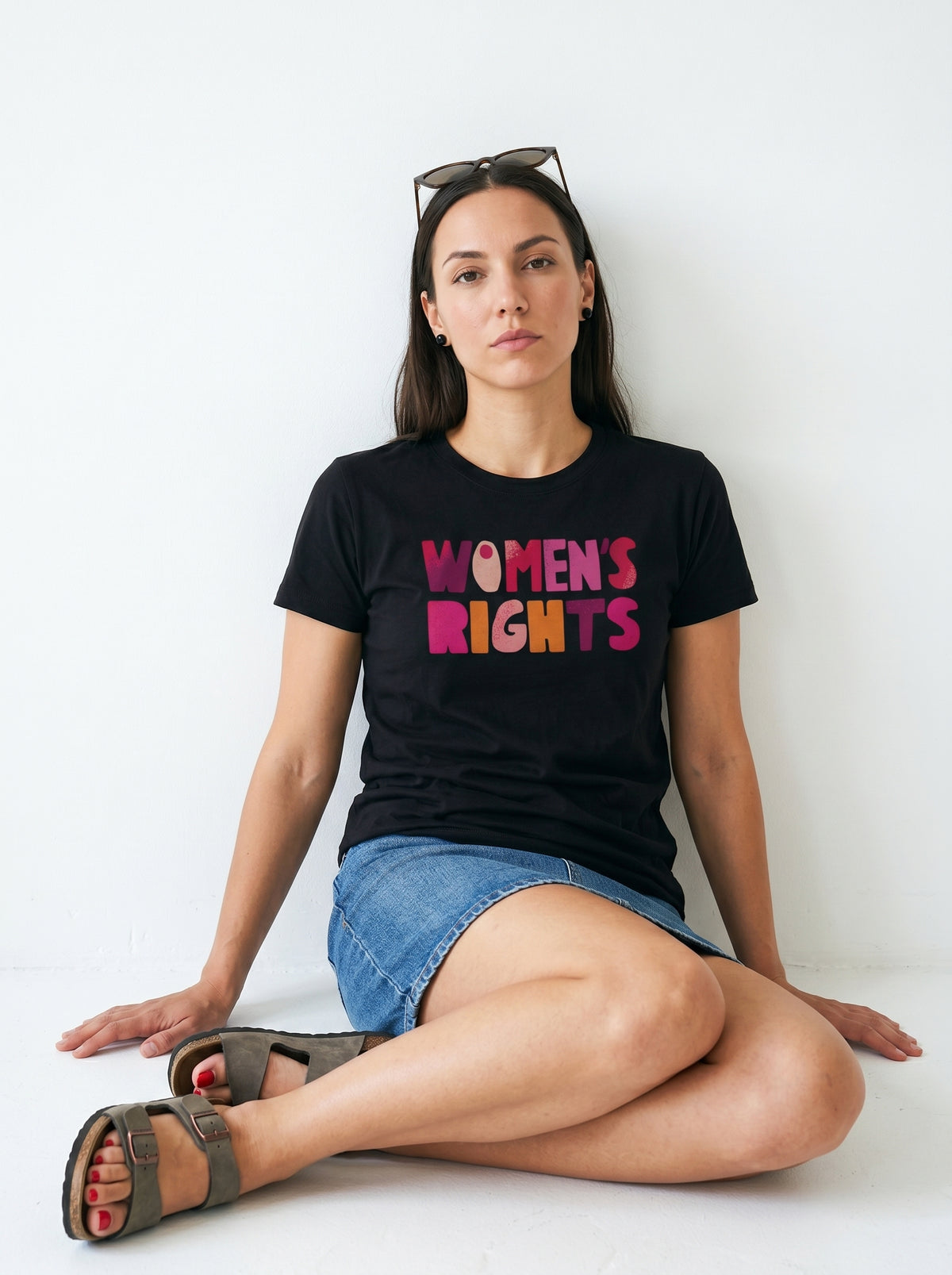 gravisk Women’s Rights. No Compromise. organic graphic tee. WOMEN'S RIGHTS in chunky hand-cut letters in pinks, reds and mustard.
