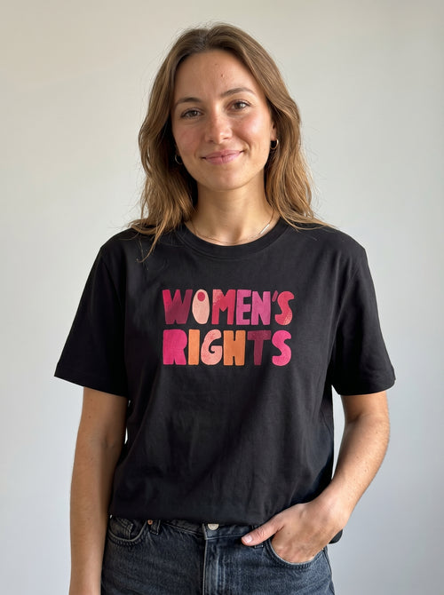 gravisk Women’s Rights. No Compromise. organic graphic tee. WOMEN'S RIGHTS in chunky hand-cut letters in pinks, reds and mustard.