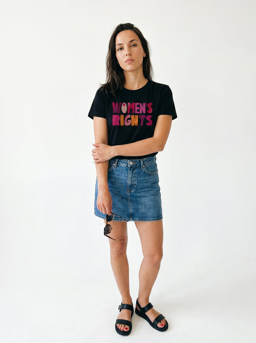 gravisk Women’s Rights. No Compromise. organic graphic tee. WOMEN'S RIGHTS in chunky hand-cut letters in pinks, reds and mustard.