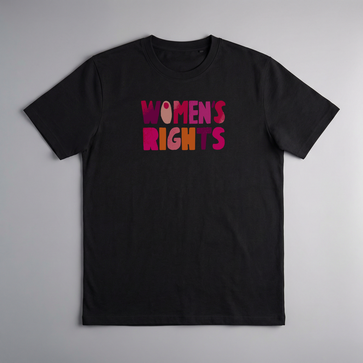 gravisk Women’s Rights. No Compromise. organic graphic tee. WOMEN'S RIGHTS in chunky hand-cut letters in pinks, reds and mustard.